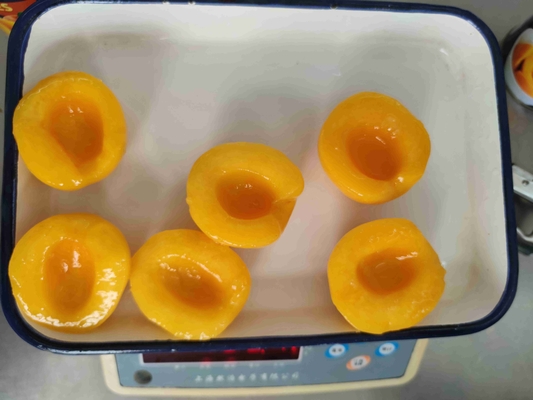 شیرین طبیعی کنسرو شده میوه هلو زرد خوشمزه در دمای اتاق نگهداری