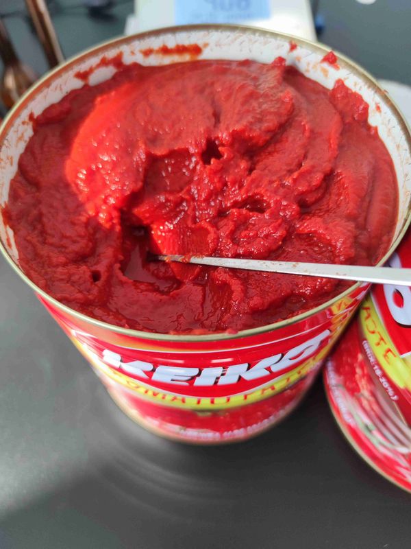 گوجه فرنگی کنسرو شده گوجه فرنگی خمیر اصلی مواد تشکیل دهنده گوجه فرنگی وضعیت غلظت سه گانه دستورالعمل ذخیره سازی ذخیره در یخچال