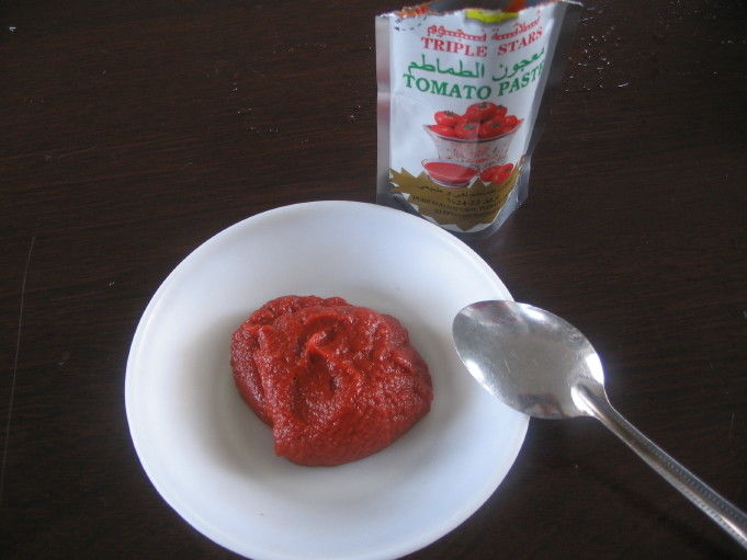 رب گوجه فرنگی کنسرو شده با رنگ تقویت شده برای دستور العمل های پر جنب و جوش و آب دهان